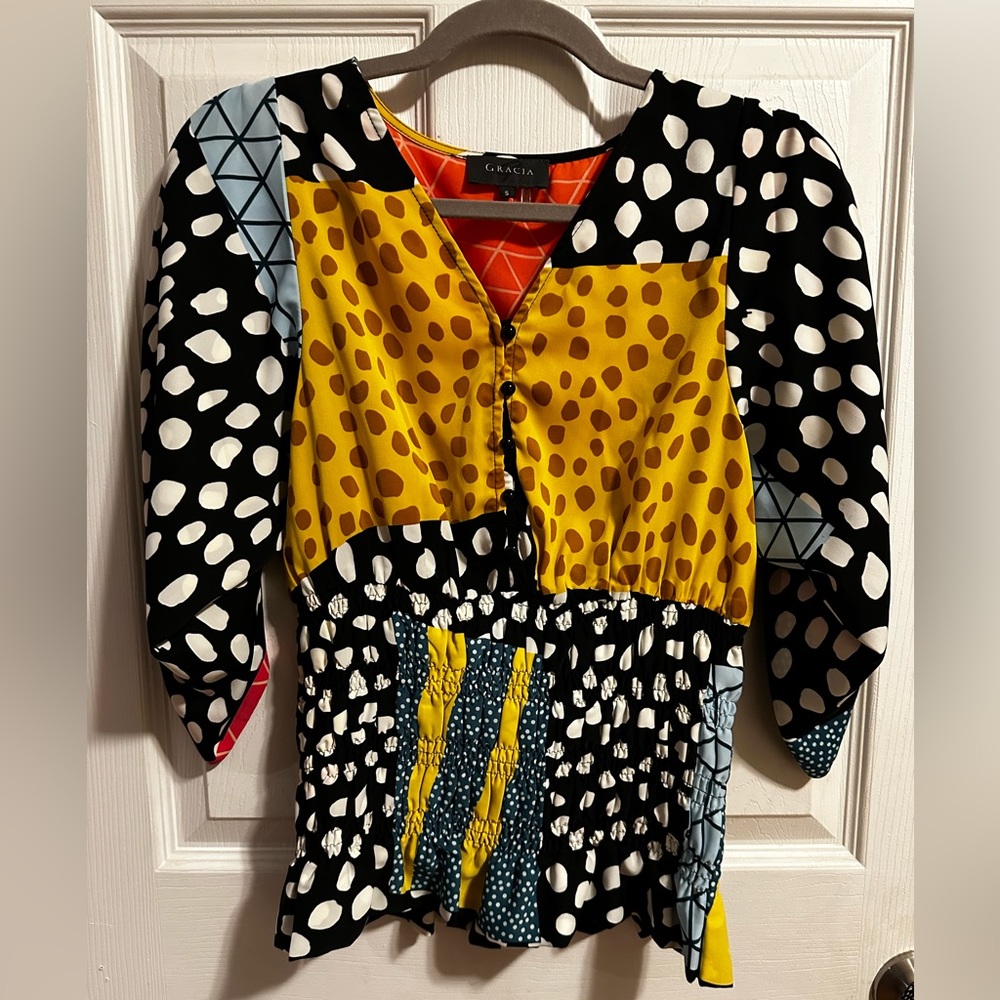 Multicolored blouse with a corset style stretch waist